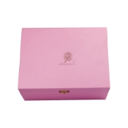 A variety of delicious Greek pastries, almonds, and cookies displayed inside a pink box.